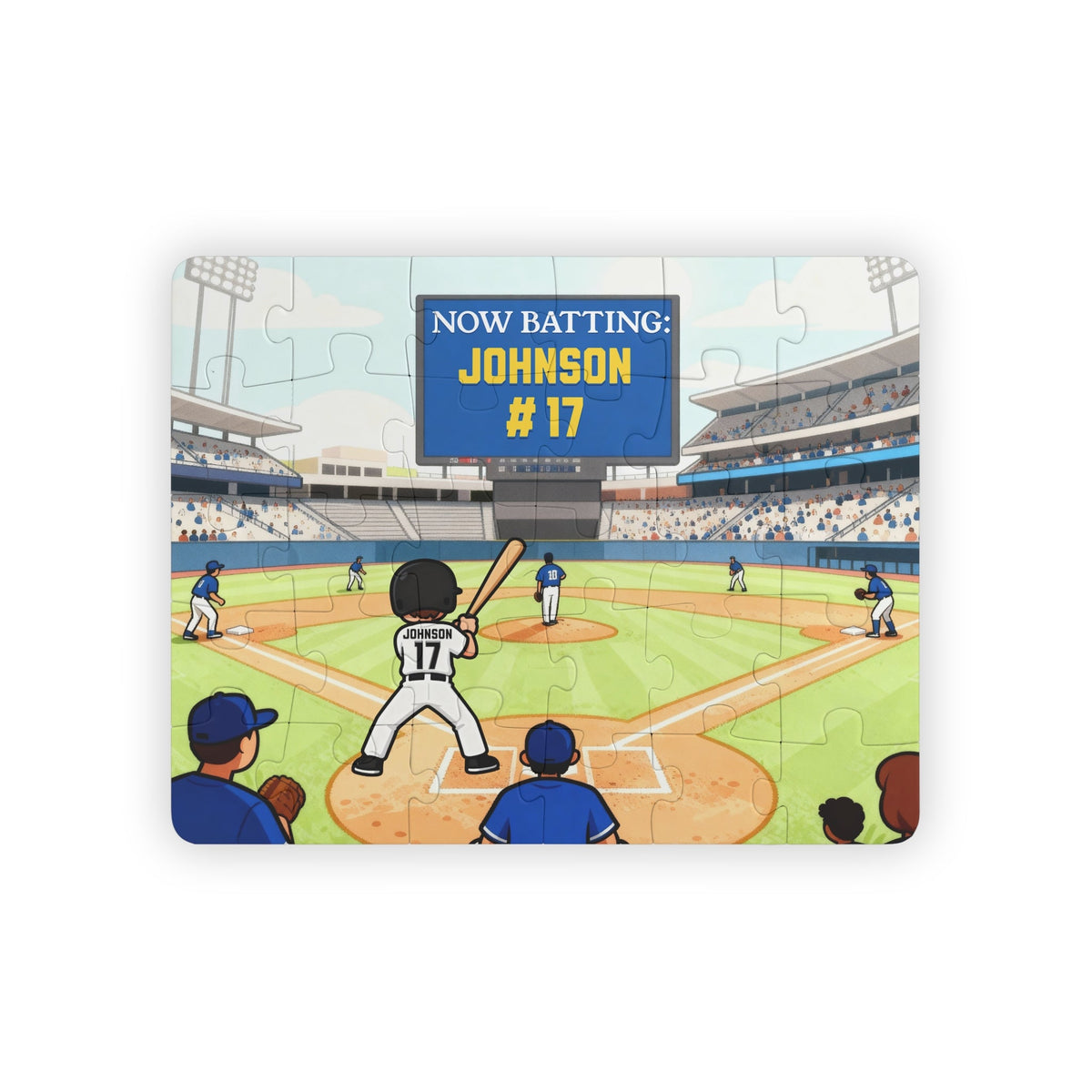Personalized baseball puzzle showing a child standing at home plate in a packed stadium, holding a bat, with a digital scoreboard that reads “Now Batting: Johnson #17.” The player’s name and jersey number can be customized, and the colorful illustrated field includes teammates, fans, and stadium lights.