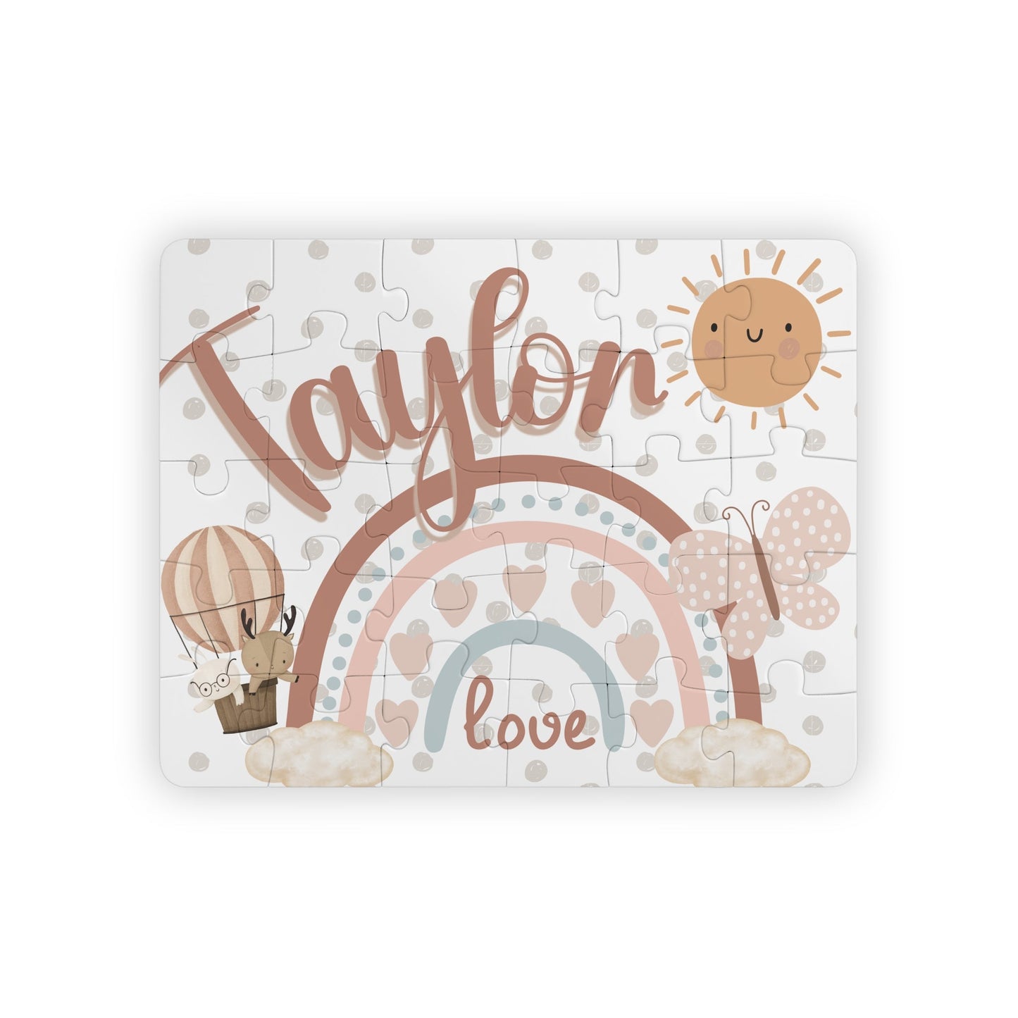 Boho rainbow themed personalized name puzzle for kids, showing a 30-piece jigsaw with a customizable child’s name printed across the top of the puzzle design.
