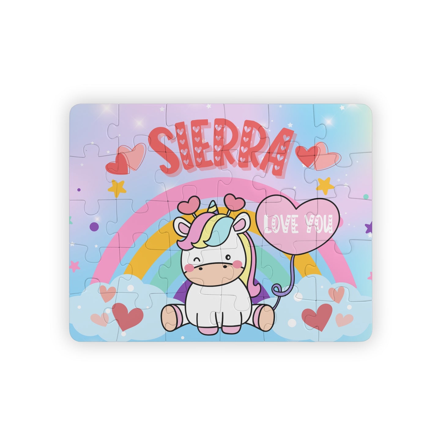 Personalized unicorn name puzzle for kids featuring a cute cartoon unicorn sitting on clouds with a rainbow, hearts, and a heart-shaped balloon that says “Love You.” The child’s name is customizable and appears large across the top of the puzzle (shown as “Sierra”), making this a custom 30-piece jigsaw designed for toddlers and young children.