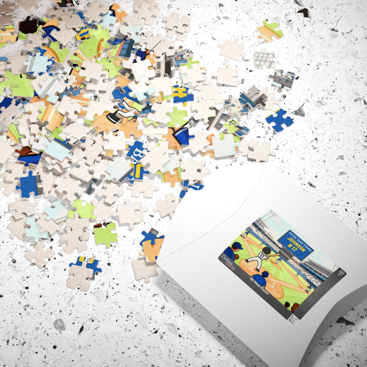 Personalized baseball puzzle for kids displayed with its box and scattered jigsaw pieces, featuring a stadium scene and a custom player name and jersey number on the scoreboard.