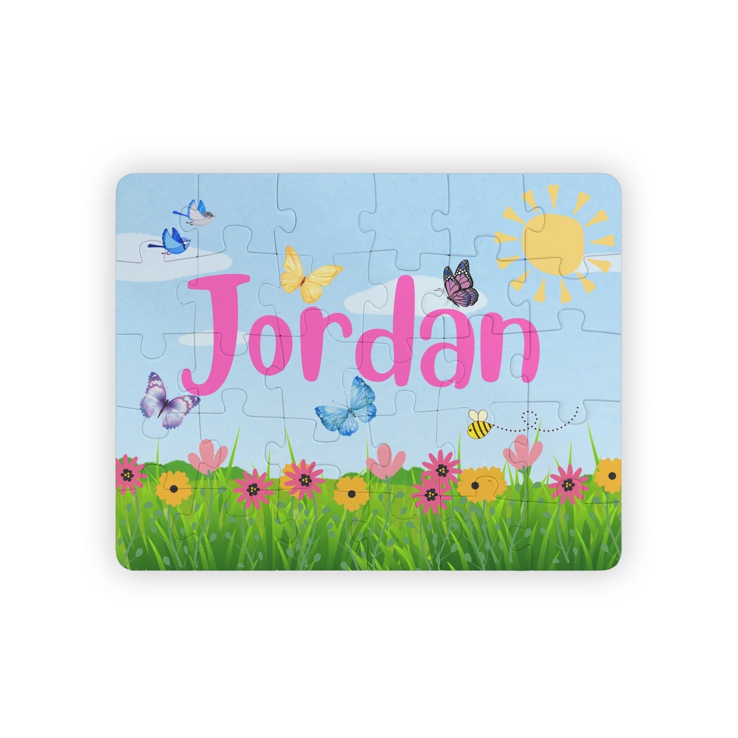 Personalized 30-piece kids jigsaw puzzle featuring a sunny day garden scene with flowers, butterflies, birds, and bees, with a customizable child’s name displayed across the center of the puzzle design.