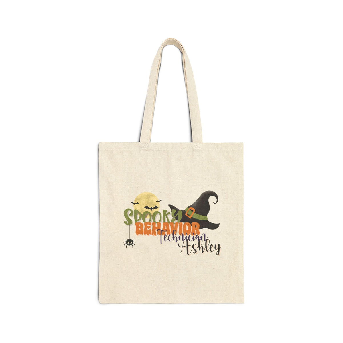 Personalized cotton canvas tote bag on a white background, featuring a Halloween-themed spooky design with a witch hat and moon, and a customizable name printed beneath the design on the front of the bag.