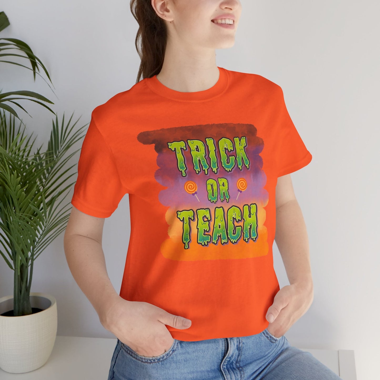 Fun Teacher Halloween Shirt- Unisex Design for Educators Trick or Teach Printify