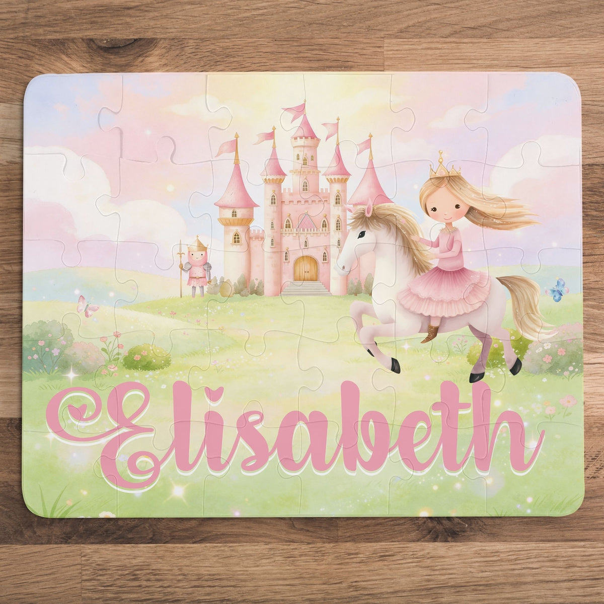Completed 30-piece personalized princess puzzle featuring a soft pastel fairytale scene with a princess on horseback, pink castle, flowers, sky, and a customizable child’s name across the bottom.