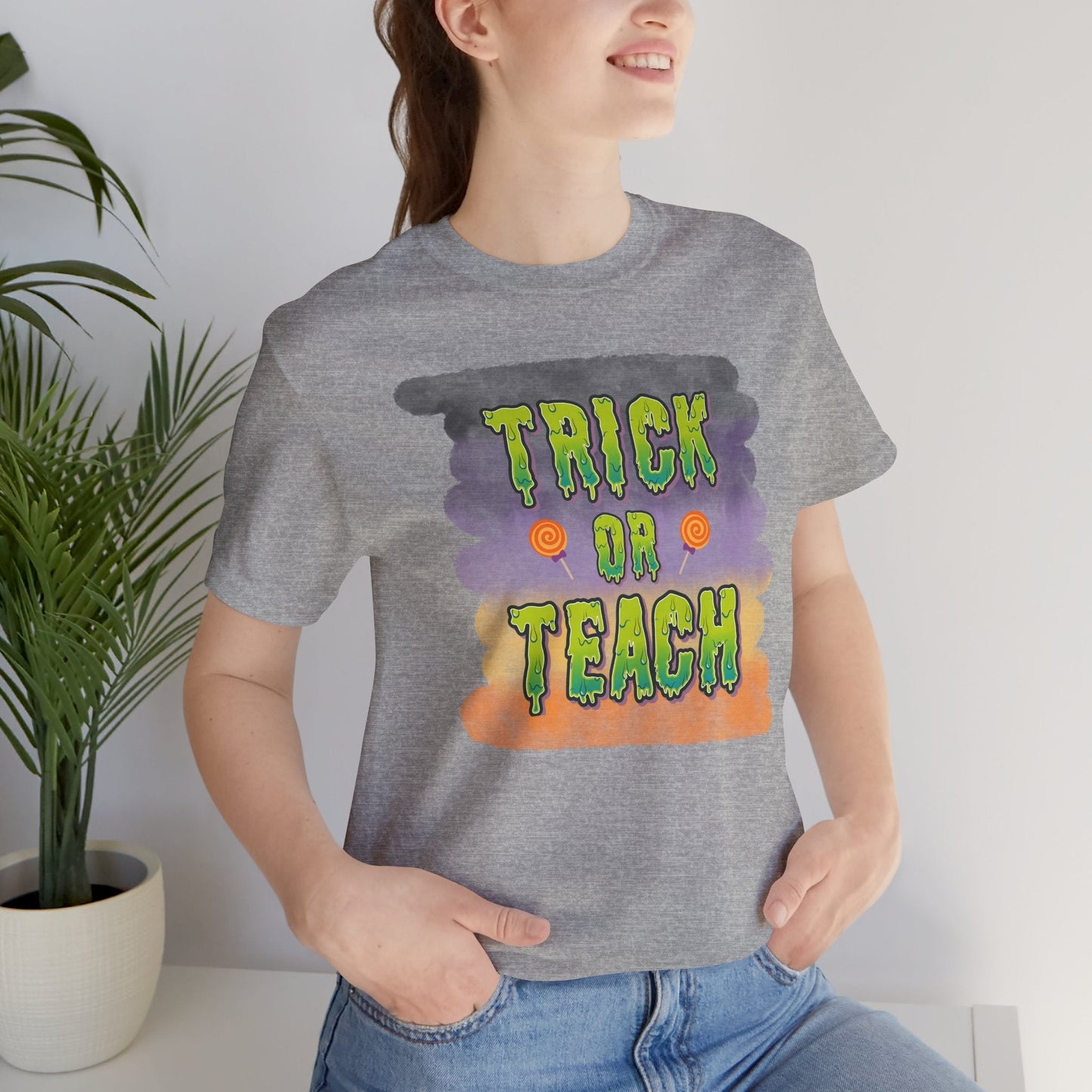 Fun Teacher Halloween Shirt- Unisex Design for Educators Trick or Teach Printify