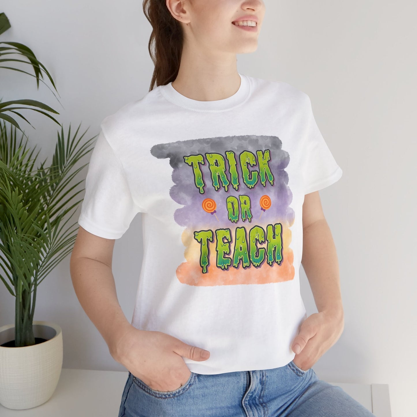 Fun Teacher Halloween Shirt- Unisex Design for Educators Trick or Teach Printify