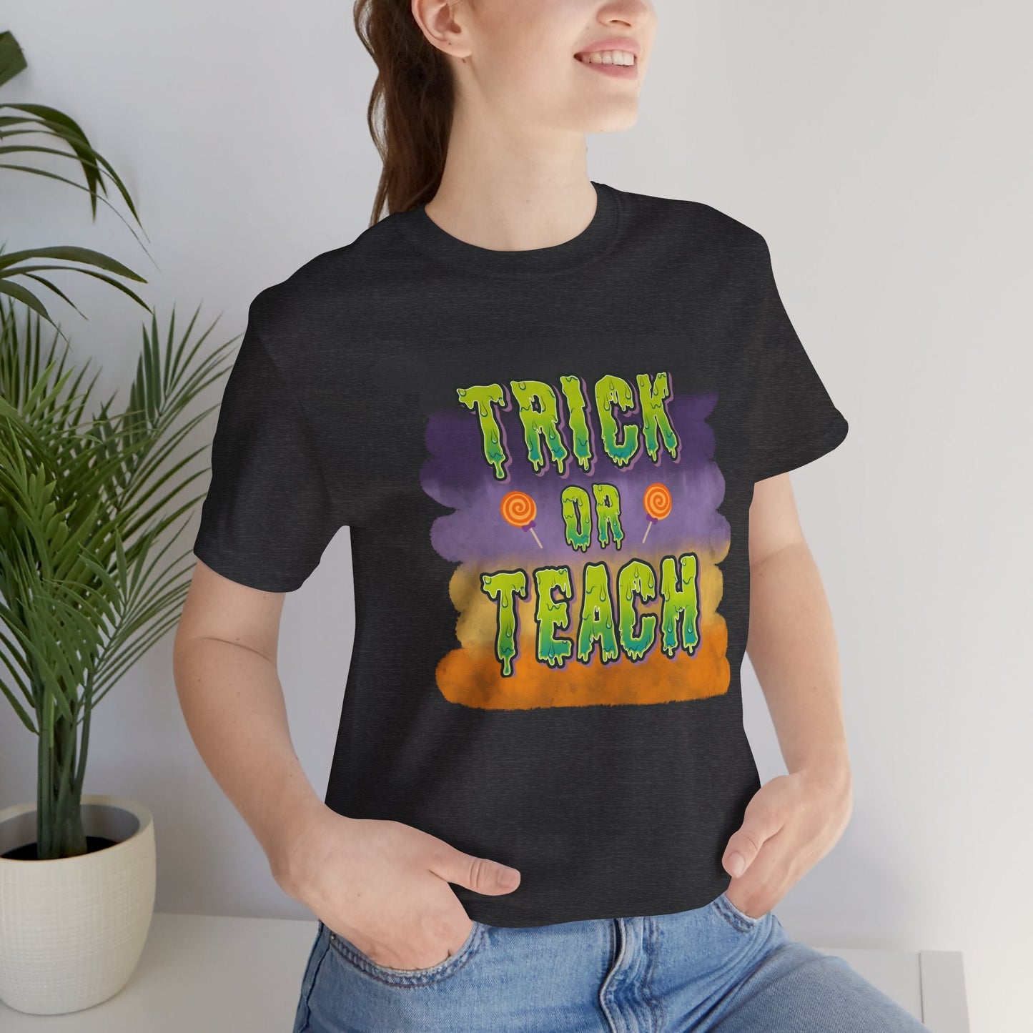 Fun Teacher Halloween Shirt- Unisex Design for Educators Trick or Teach Printify