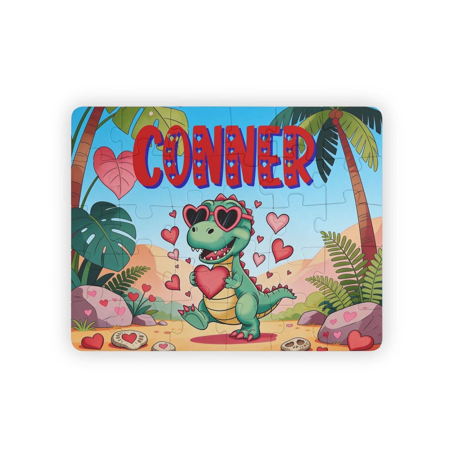 Personalized Valentine dinosaur name puzzle for kids featuring a cute green dino holding a heart, surrounded by floating hearts in a tropical scene. The child’s name is customizable and appears large across the top of the puzzle (shown as “Conner”), making this a custom 30-piece jigsaw designed for toddlers and young children.