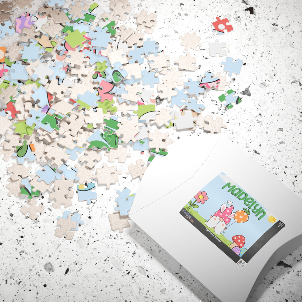 Personalized Easter gnome puzzle shown with its box and scattered pieces, featuring a spring gnome scene and custom name placement designed for kids