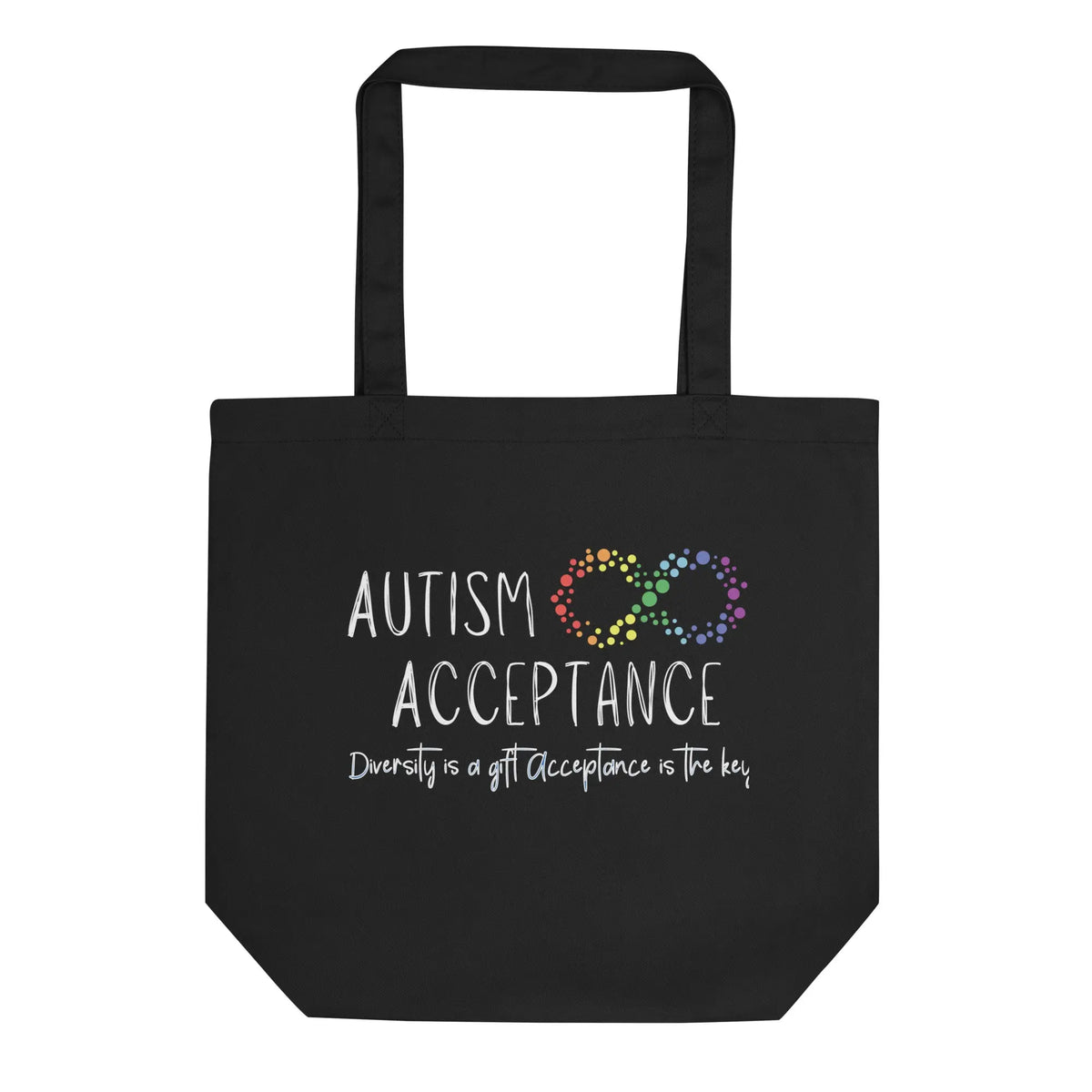 Black cotton canvas tote bag on a white background, featuring an autism acceptance design with an infinity symbol and message printed on the front.