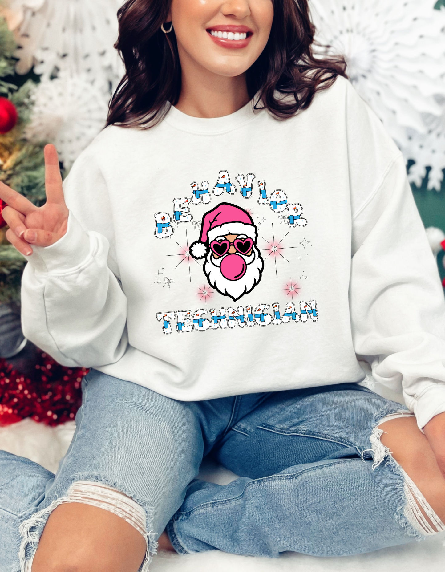 Funny Christmas sweater for behavior Technician. Has a Santa wearing glasses and blowing bubblegum bubbles that says Behavior Technician. Perfect festive sweatshirt for self or as a gift for a behavior Technician