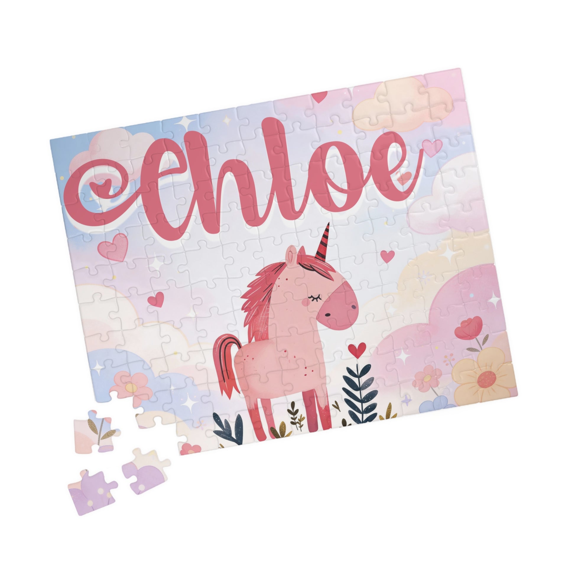 Personalized unicorn puzzle with customizable child’s name in pink script above a pastel unicorn scene