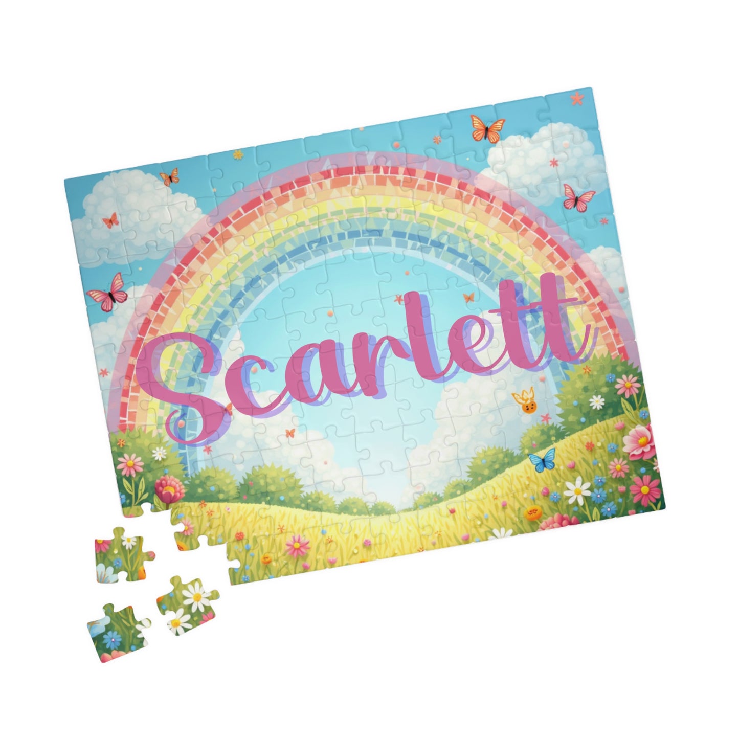 Completed 110-piece personalized spring puzzle with a rainbow, butterflies, and a custom name centered on the puzzle artwork.