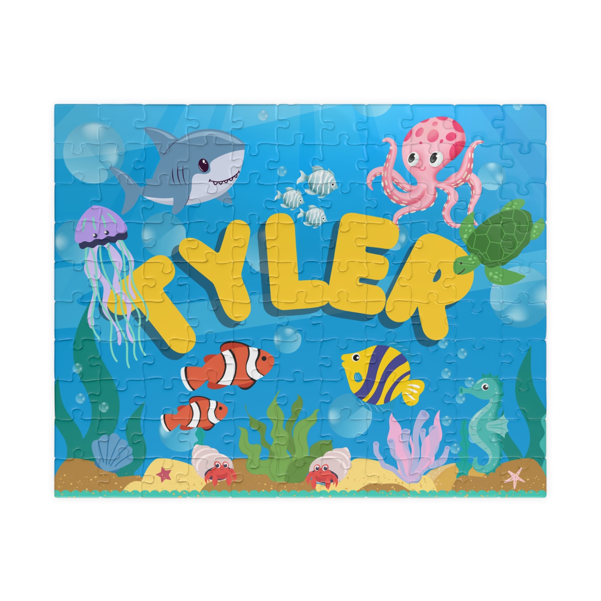 Personalized 110-piece ocean puzzle featuring an underwater scene with sea animals and a customizable name displayed in the center.