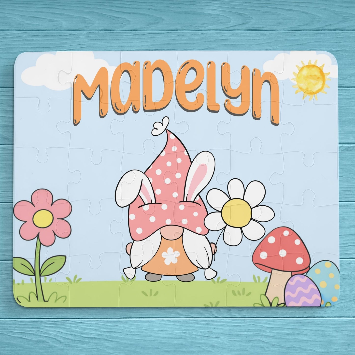 Personalized Easter gnome name puzzle shown as a 30-piece jigsaw with a spring gnome illustration, flowers, mushrooms, and soft pastel colors. Custom name displayed at the top with selectable gnome and font color options.