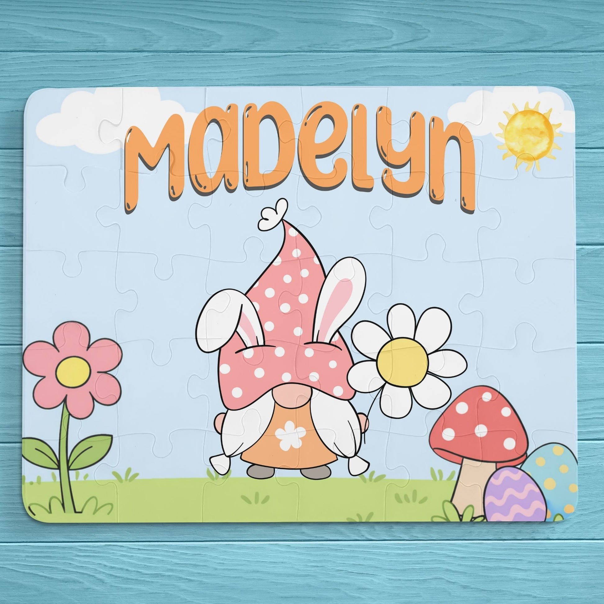 Personalized Easter gnome name puzzle shown as a 30-piece jigsaw with a spring gnome illustration, flowers, mushrooms, and soft pastel colors. Custom name displayed at the top with selectable gnome and font color options.