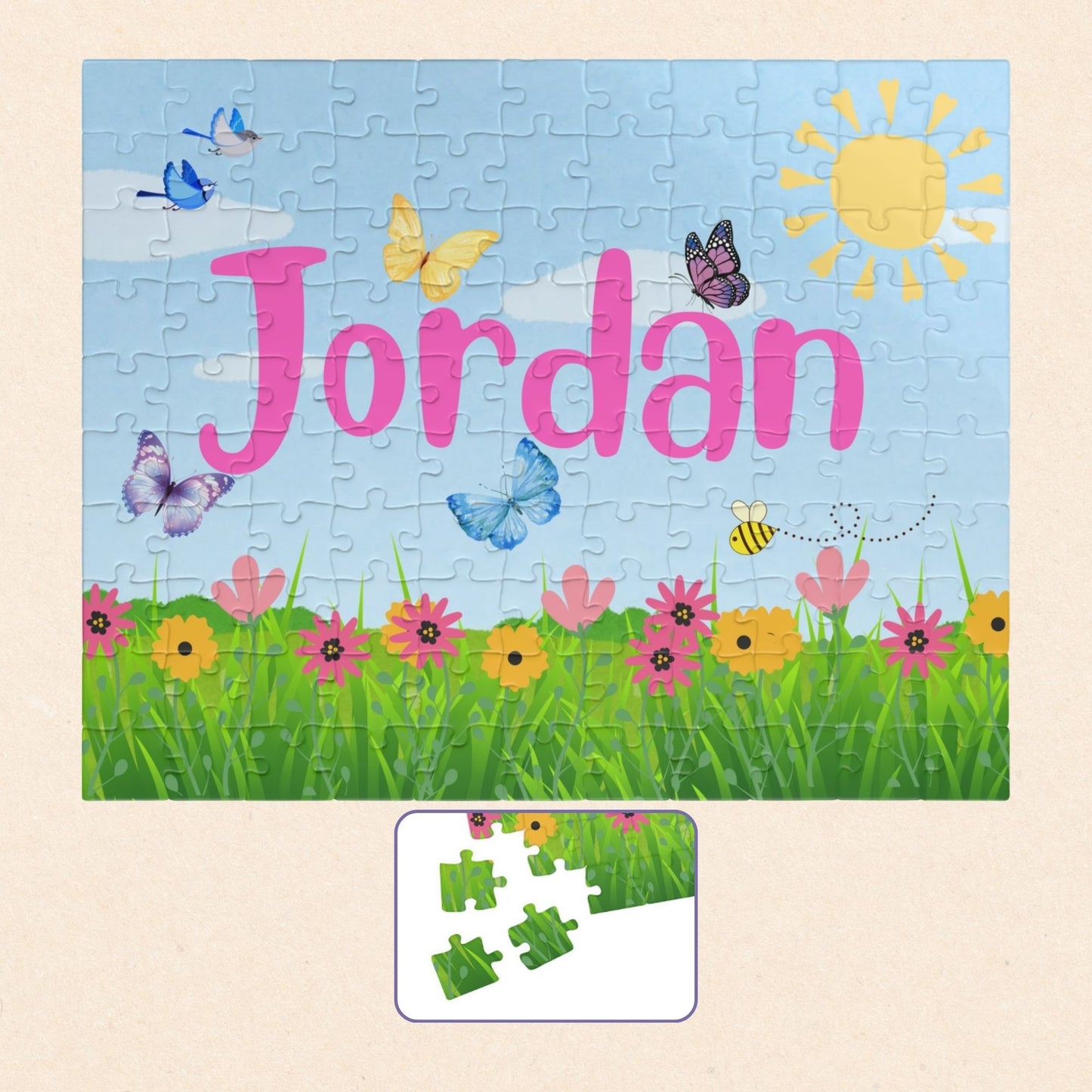 Personalized 110 piece spring themed jigsaw puzzle with a customizable name displayed across the center, featuring butterflies, birds, flowers, green grass, and a sunny sky