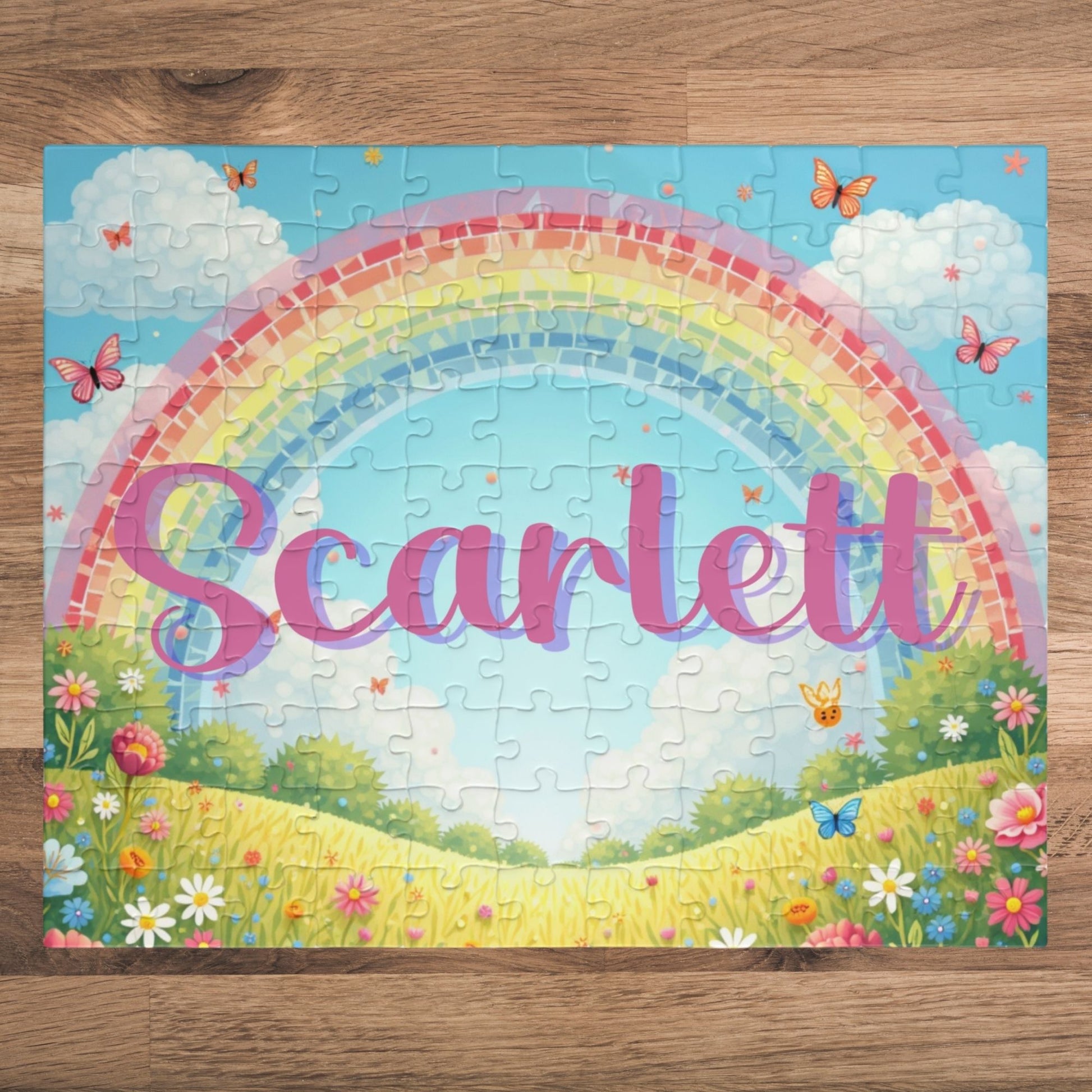 Personalized 110-piece spring puzzle featuring a rainbow and butterflies with a customizable child’s name displayed across the center of the design.