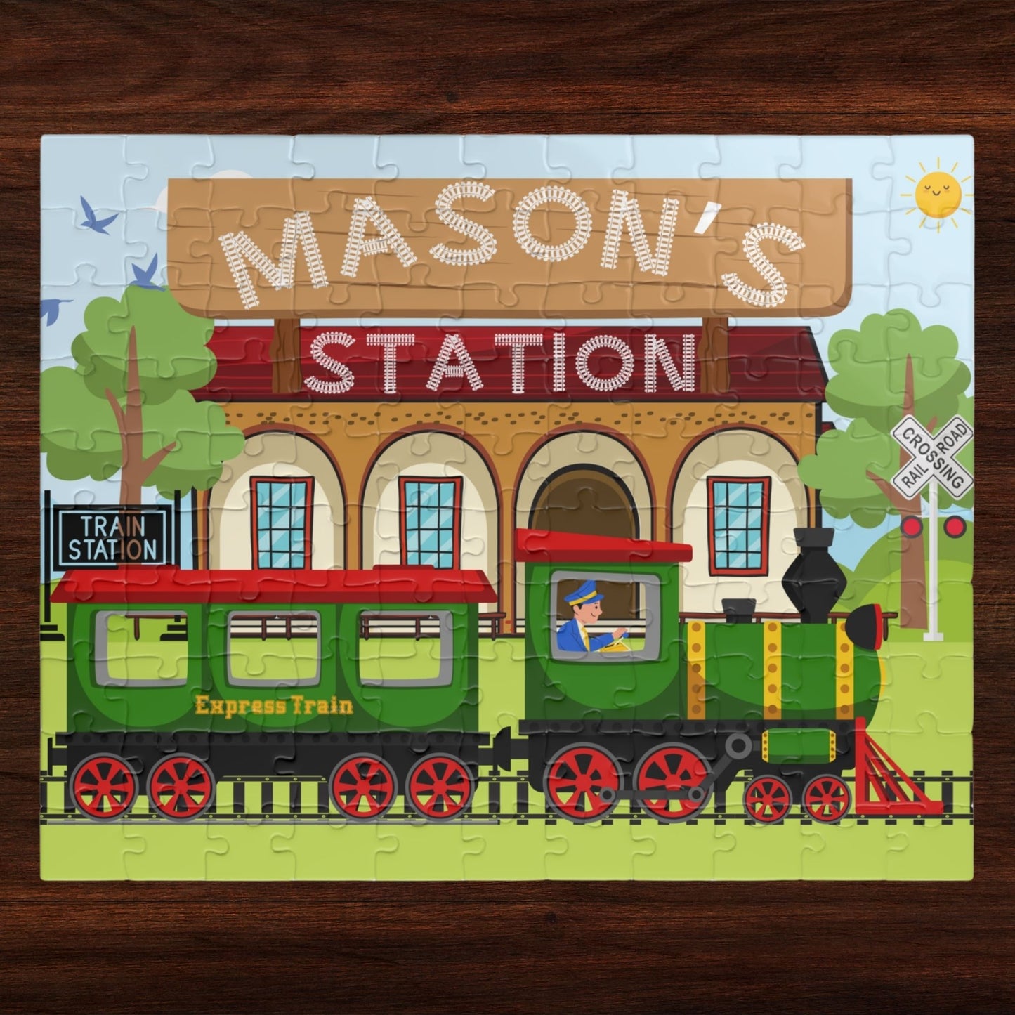 Personalized 110 piece train puzzle featuring a colorful train station scene with a customizable name displayed on the station sign