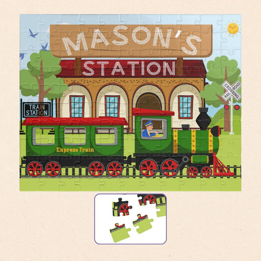 Personalized 110 piece train puzzle featuring a colorful train station scene with a customizable name displayed on the station sign