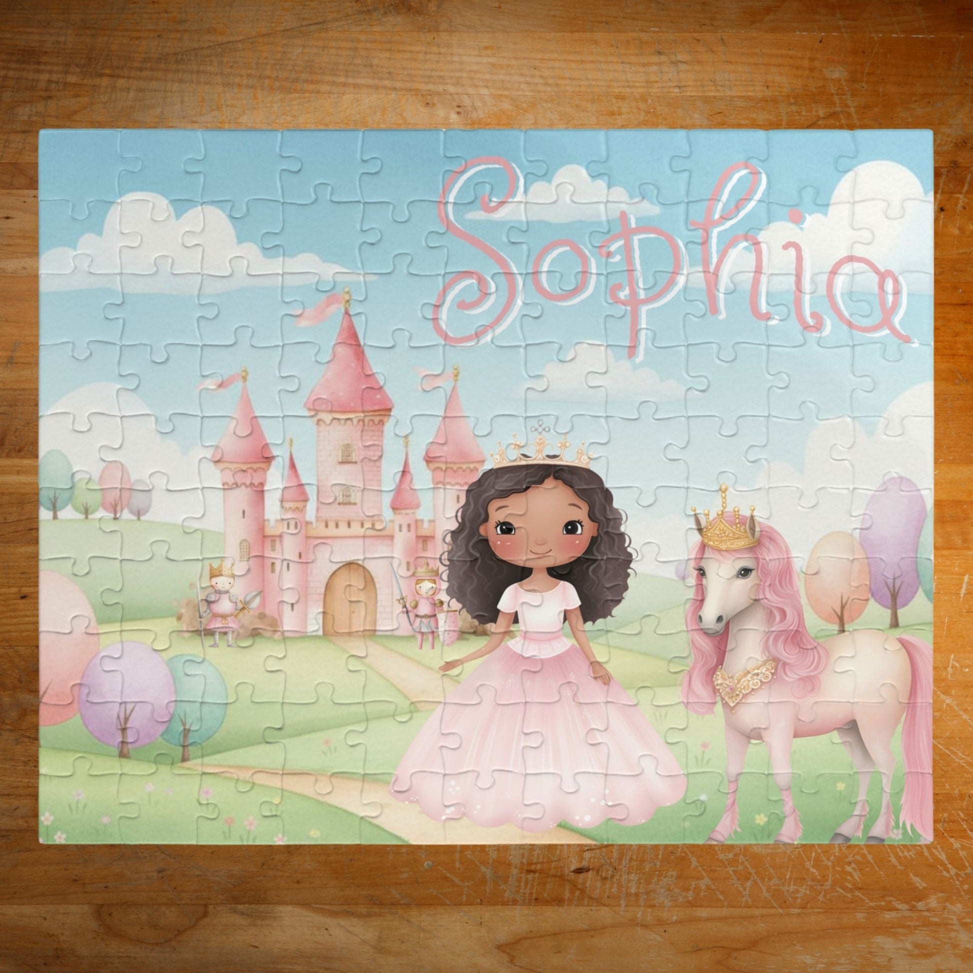 Completed personalized princess puzzle featuring a pastel castle scene, princess character, horse, rolling hills, and a customizable child’s name displayed prominently across the top