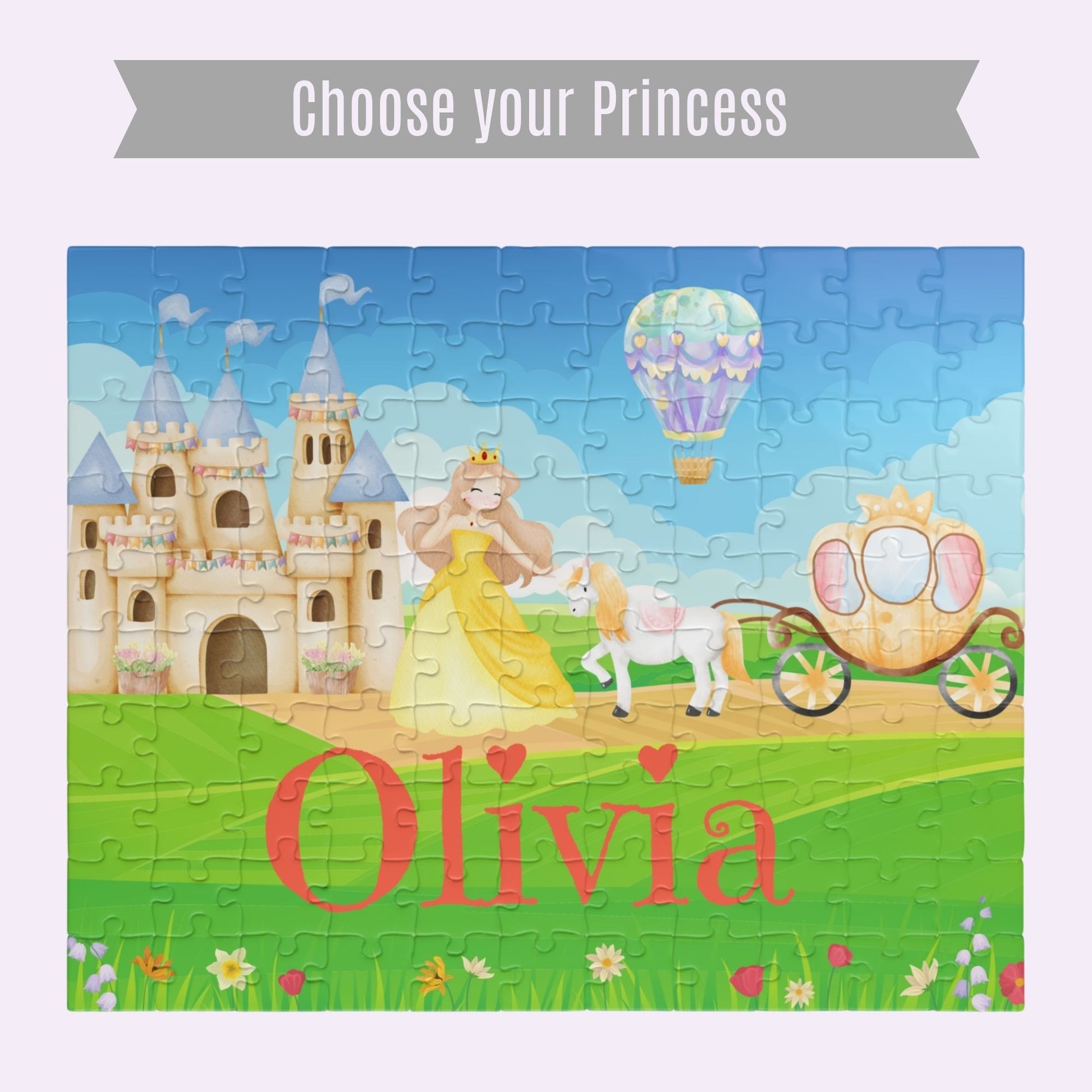 Completed personalized princess puzzle featuring a fairytale castle, princess character, horse, royal carriage, hot air balloon, bright sky, and a customizable child’s name across the grass. Includes a banner that says "choose your princess"