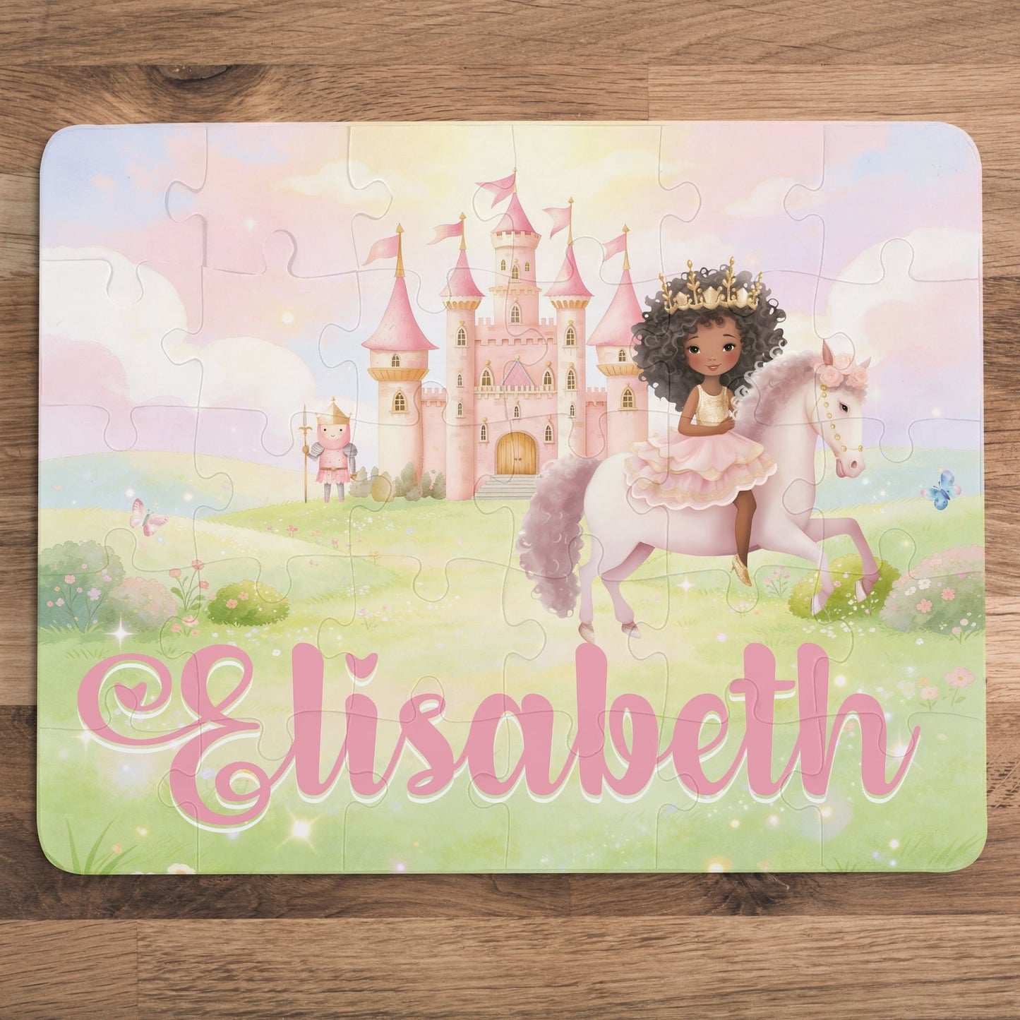 Completed 30-piece personalized princess puzzle featuring a soft pastel fairytale scene with a princess on horseback, pink castle, flowers, sky, and a customizable child’s name across the bottom.