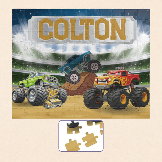 Personalized monster truck puzzle with customizable name displayed across the top, featuring a stadium scene with colorful trucks in action and bold, kid-friendly design.