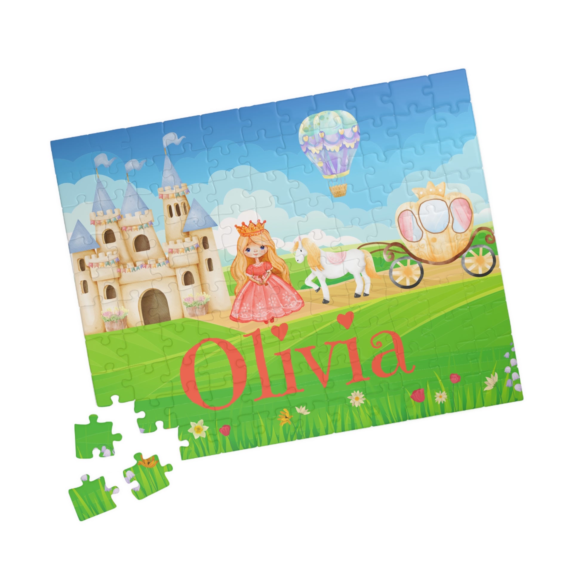 110-piece personalized princess puzzle showing a castle scene with a princess in a pink dress, horse, carriage, hot air balloon, green hills, and a customizable child’s name across the bottom.