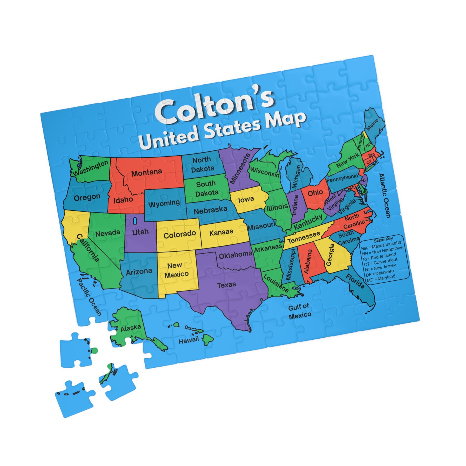 Completed personalized United States map puzzle displaying a child's custom name above a colorful labeled map of the United States with all 50 states identified.