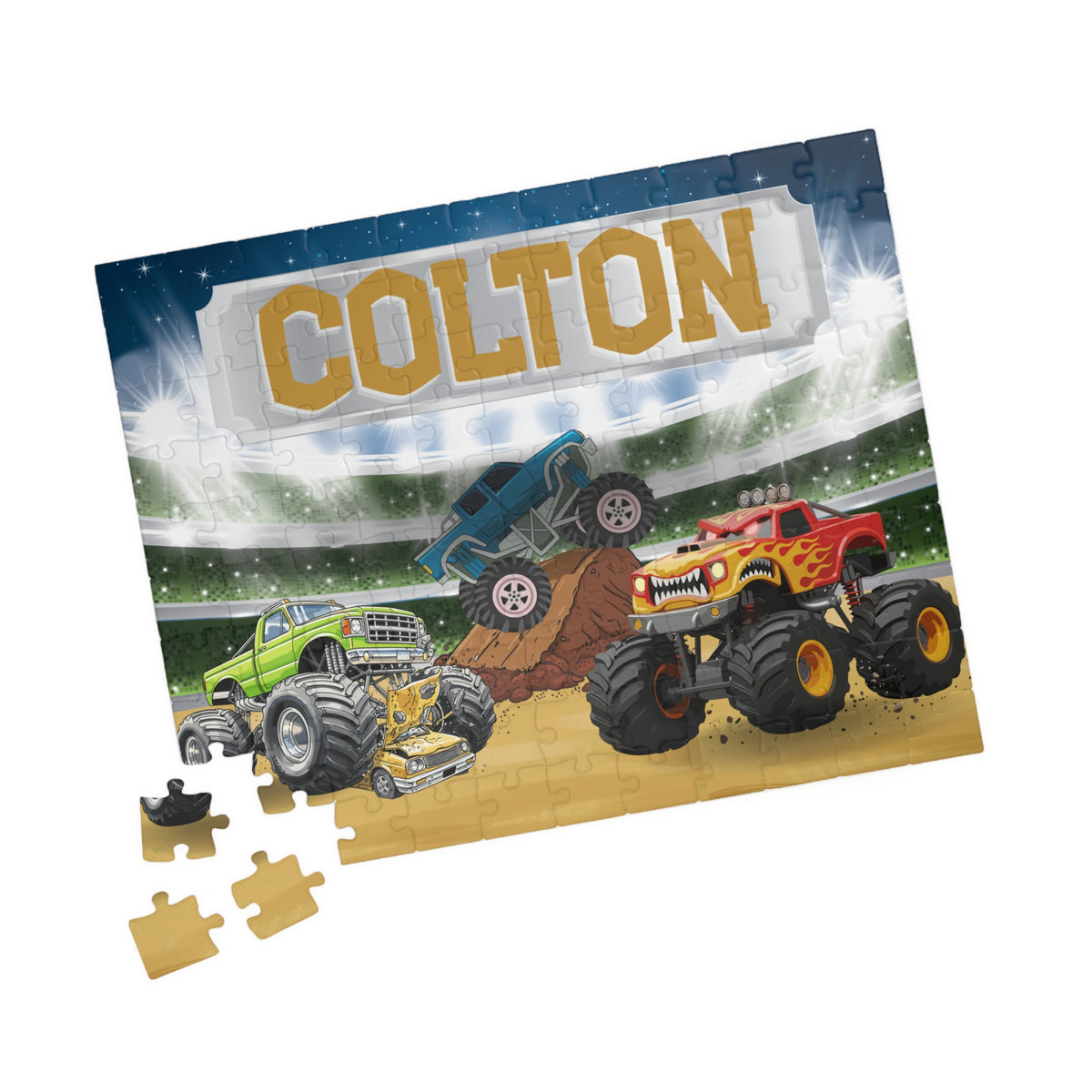 A custom jigsaw puzzle featuring monster trucks at a stadium with name in large gold letters. 