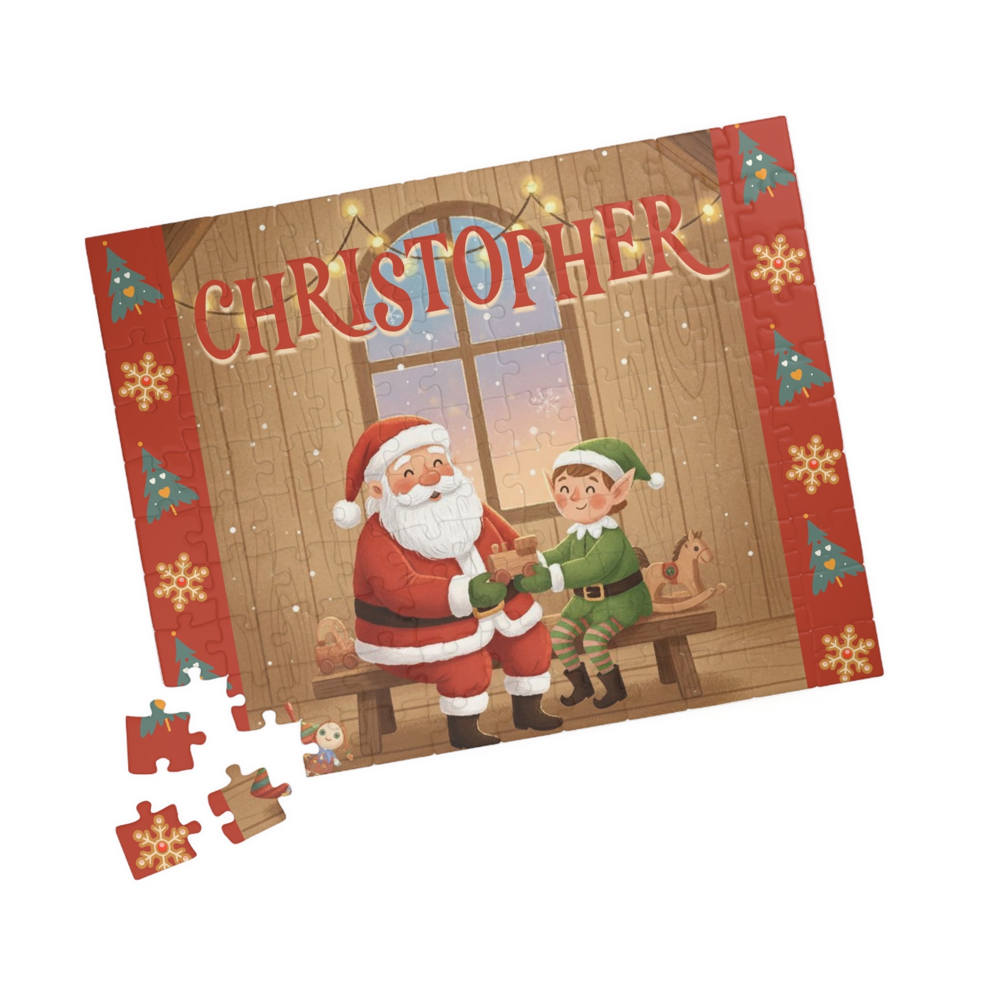 Angled view of a personalized Santa and elf Christmas puzzle with a custom name and loose puzzle pieces beside the completed design.