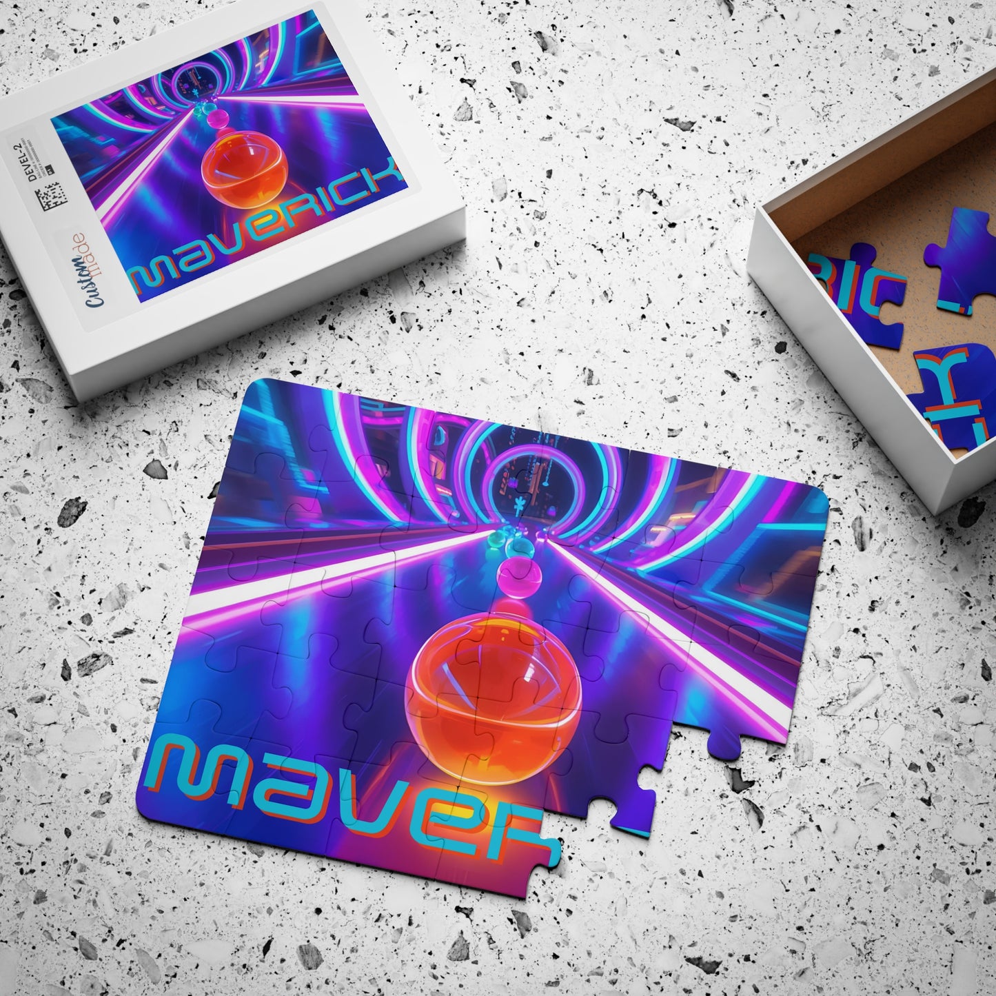 Personalized neon marble race 30-piece jigsaw puzzle displayed with the puzzle box and loose pieces. Bright neon track artwork with rolling marbles and a customizable name built into the design.