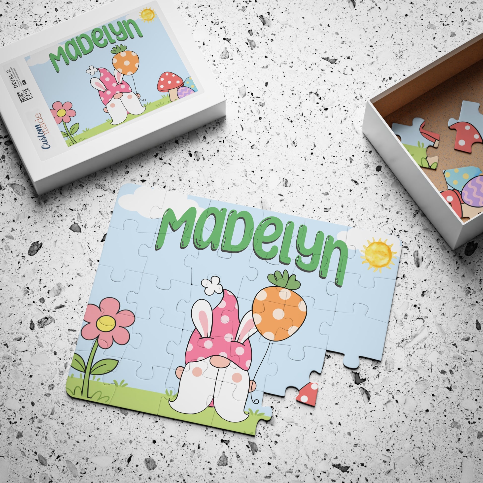 Personalized Easter gnome puzzle shown with its box and loose pieces, highlighting the spring-themed illustration and custom name placement on a 30-piece jigsaw.