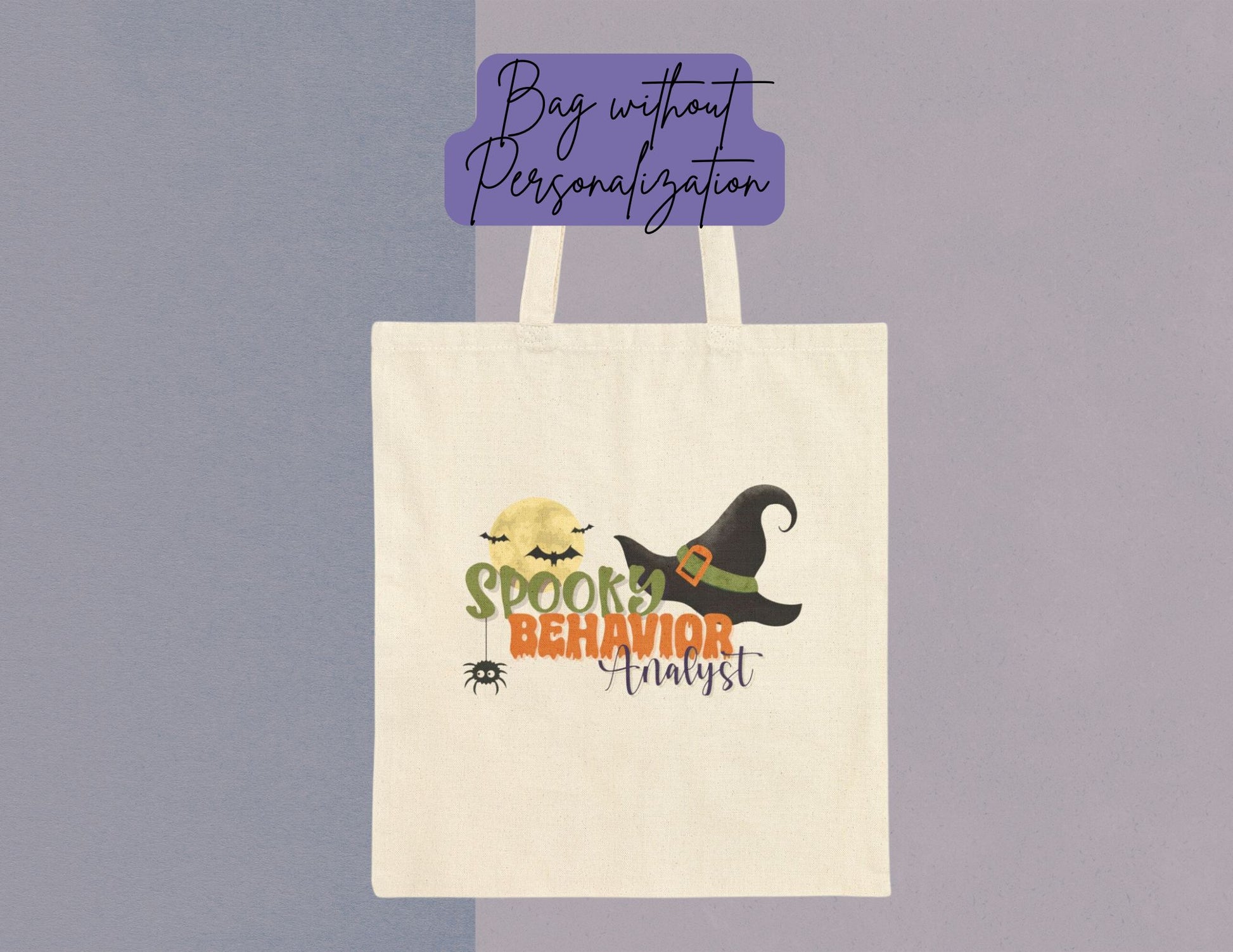 Natural canvas tote bag featuring a witch-themed Halloween design that reads “Spooky Behavior Analyst,” with a moon, bats, spider, and witch hat graphic centered on the front of the bag. shown in the non personalized version