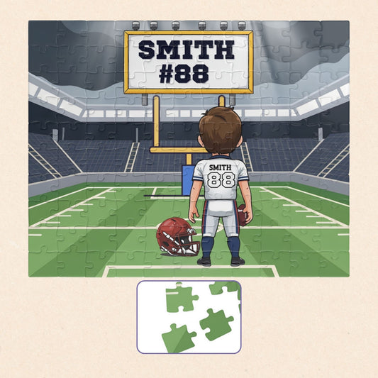 Personalized boys football stadium puzzle showing a child player from behind on a football field, with a customizable name and number  displayed both on the scoreboard and  jersey
