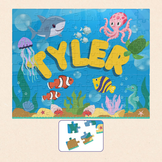 Personalized 110-piece ocean puzzle featuring an underwater scene with sea animals and a customizable name displayed in the center.