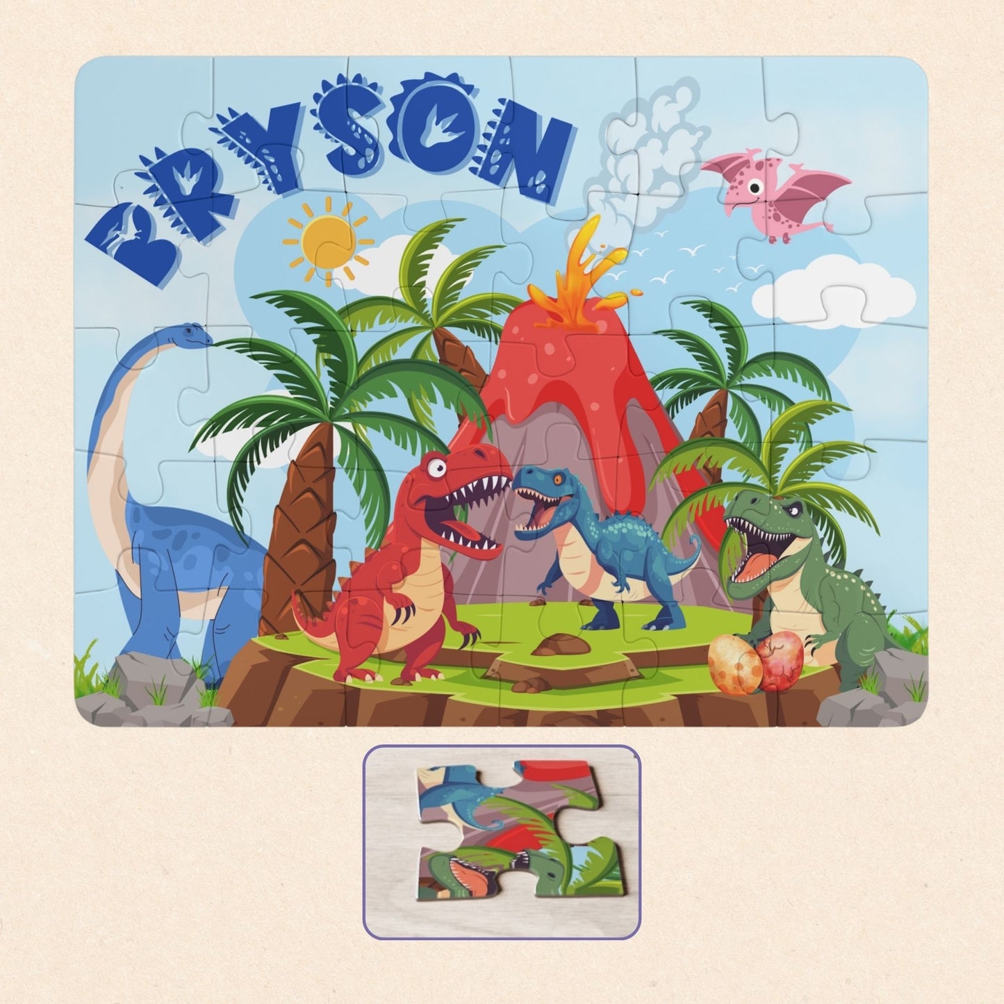 Personalized dinosaur name puzzle for kids featuring a colorful volcano jungle scene with T-Rex dinosaurs, palm trees, erupting volcano, and the child’s custom name displayed at the top, 30-piece custom jigsaw