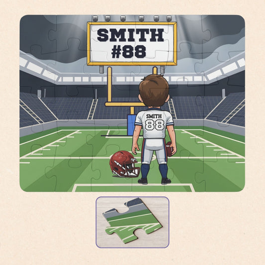 Personalized football jigsaw puzzle showing a boy standing on a football field facing a scoreboard with a customizable name and number displayed above him. The child’s name appears on the scoreboard, and the jersey number appears on the back of the uniform.