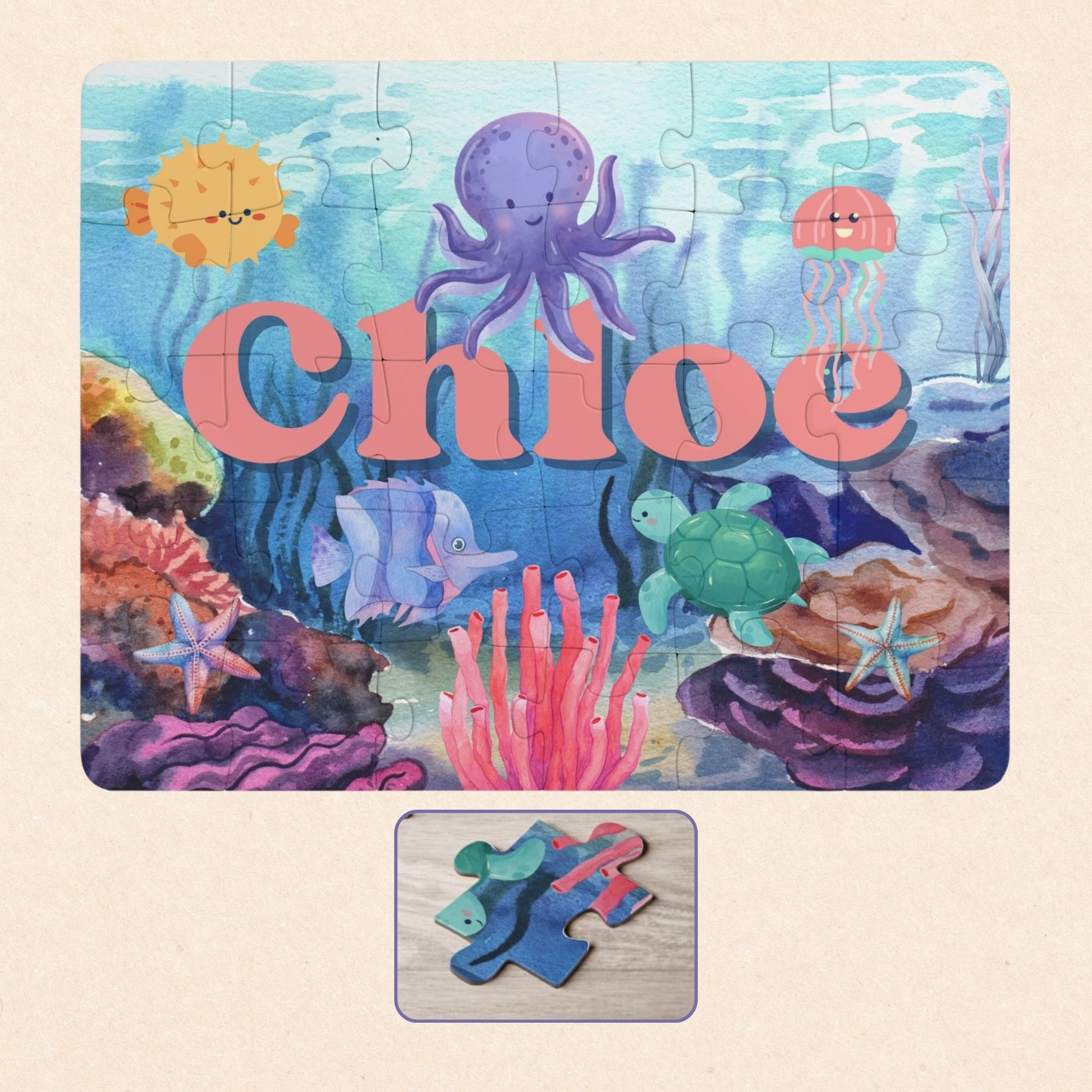 Personalized underwater name puzzle for kids featuring a colorful ocean scene with smiling octopus, jellyfish, turtle, tropical fish, coral reef, and starfish, custom child name displayed across the center on a 30-piece jigsaw puzzle