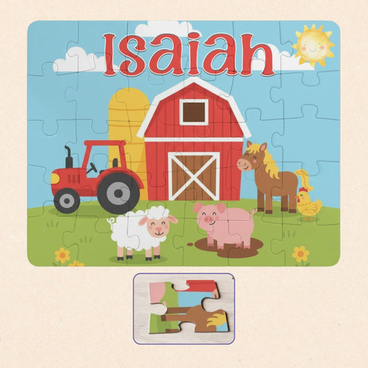 Personalized kids farm animal puzzle showing a colorful barnyard scene with a barn, tractor, horse, pig, sheep, and chicken, featuring a customizable child’s name displayed across the top of the puzzle.